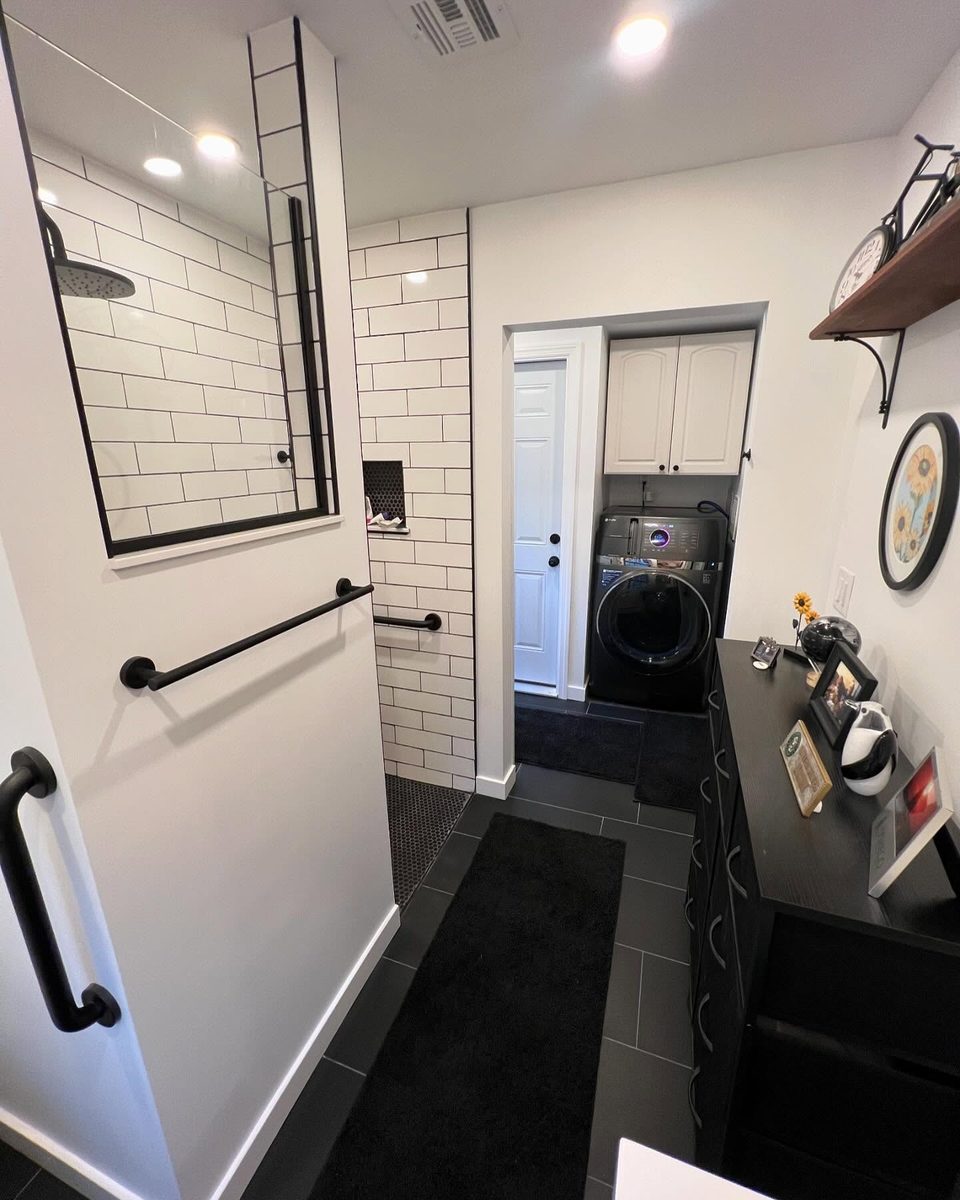 Modern black and white subway tile bathroom renovation